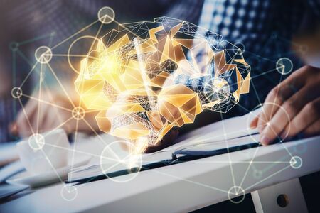 Man's hands with atificial intelligence double exposure icon. Concept of computer learning.の写真素材