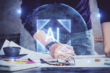 Man's hands with technology theme multi exposure icons. Concept of big data.の写真素材