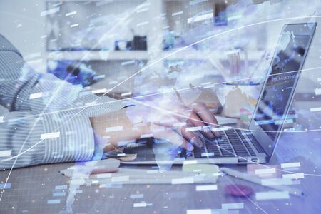 Businessman working on Laptop with technology theme drawing. Concept of big data. Double exposure.の写真素材