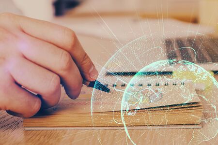 Mans hands working with notes background. Social networking scheme . Mixed mediaの写真素材