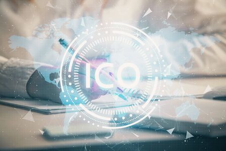 Cryptocurrency hologram over womans hands writing background. Concept of blockchain. Double exposureの写真素材