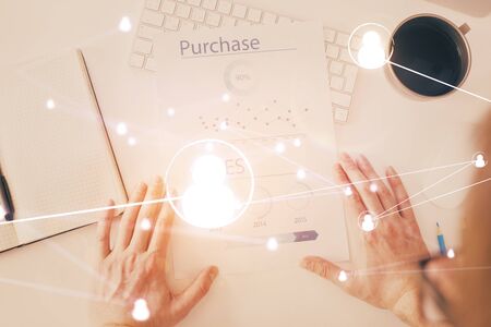 Mans hands working with notes background. Social networking scheme . Mixed mediaの写真素材