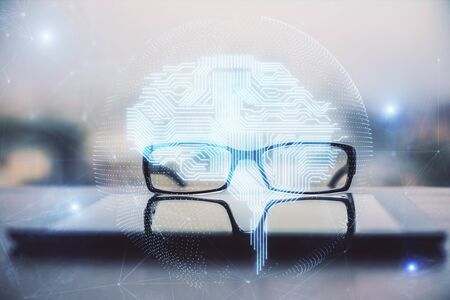 Brain drawings with glasses on the table background. Double exposure.