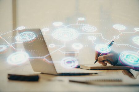 Social network theme hologram with businessman working on computer on background. Concept of world wide web. Double exposure.の写真素材