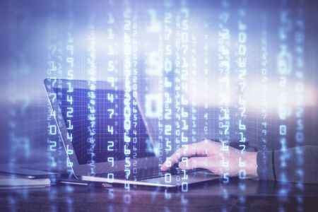 A man working on Laptop with technology theme drawing. Concept of big data. Double exposure.