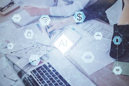 Double exposure of womans writing hand on background with data technology hud. Big data concept.の写真素材