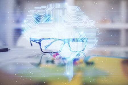 Brain drawings with glasses on the table background. Double exposure.の写真素材