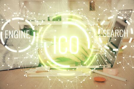 Blockchain theme hud with businessman working on computer on background. Concept of crypto chain. Double exposure.の写真素材