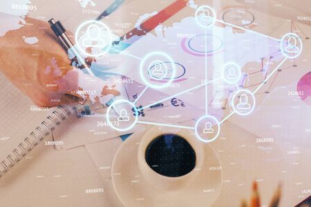 Mans hands working with notes background. Social networking concept.の写真素材