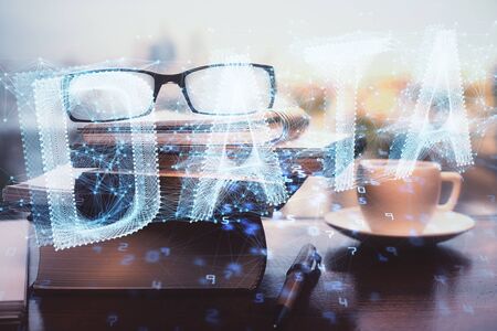 Data tech hologram with glasses on the table background. Concept of technology. Double exposure.の写真素材
