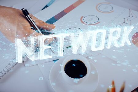 Writing man's hands background with technology huds. Double exposure. Concept data.の写真素材