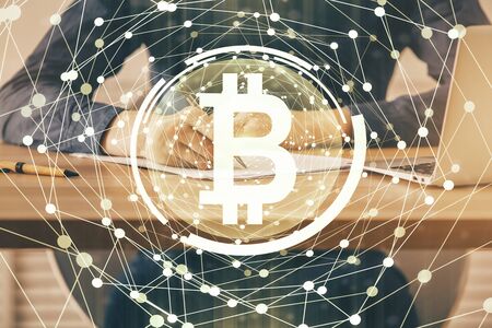 Mans hands working with notes background. Cryptocurrency and finance concept.の写真素材