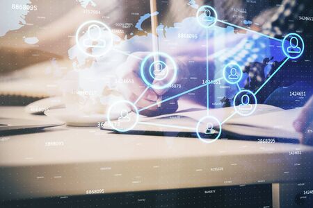 Mans hands working with notes background. Social networking concept.の写真素材