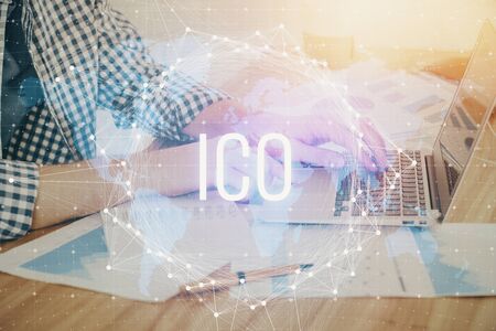 Blockchain theme hud with man working on computer on background. Concept of crypto chain. Double...