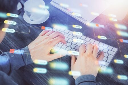Double exposure of tech drawings with hands working on computer background. Concept of innovation.