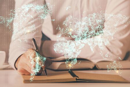 Mans hands working with notes background. Social networking concept.の写真素材