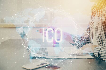 Blockchain theme hud with man working on computer on background. Concept of crypto chain. Double exposure.の写真素材