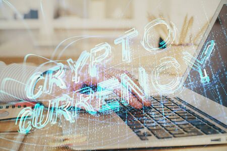 Blockchain theme hud with businessman working on computer on background. Concept of crypto chain. Double exposure.の写真素材