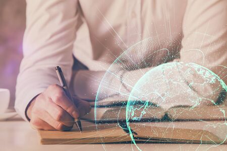Mans hands working with notes background. Social networking concept.の写真素材