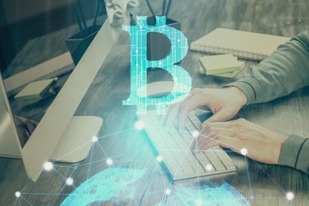 Blockchain theme hud with businessman working on computer on background. Concept of crypto chain....