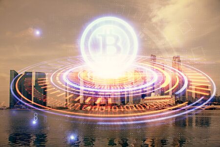 Multi exposure of cryptocurrency theme hologram drawing and city veiw background. Concept of blockchain and bitcoin.の写真素材