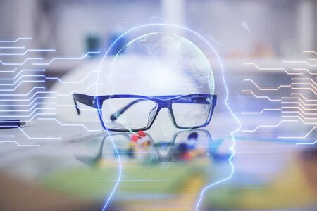 Brain drawings with glasses on the table background. Double exposure.