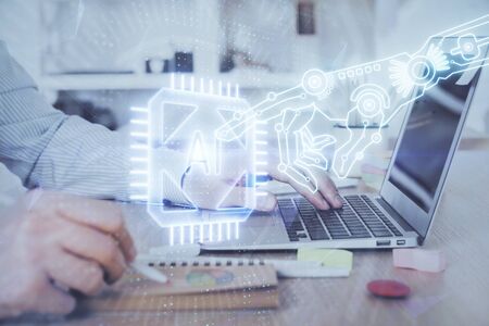 Businessman working on Laptop with technology theme drawing. Concept of big data. Double exposure.の写真素材