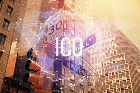 Double exposure of crypto currency theme hologram drawing and city veiw background. Concept of blockchain and bitcoin.の写真素材