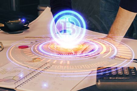 Mans hands working with notes background. Cryptocurrency and finance concept.の写真素材