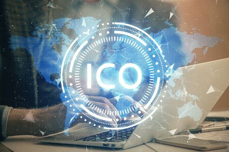Blockchain theme hud with man working on computer on background. Concept of crypto chain. Double exposure.の写真素材