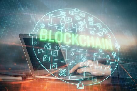 Blockchain theme hud with businessman working on computer on background. Concept of crypto chain....