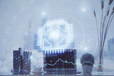 Double exposure of table with computer on background and data theme hologram. Data technology concept.の写真素材
