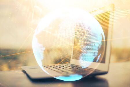 Double exposure of business theme icons and work space with computer background. Concept of success.の写真素材