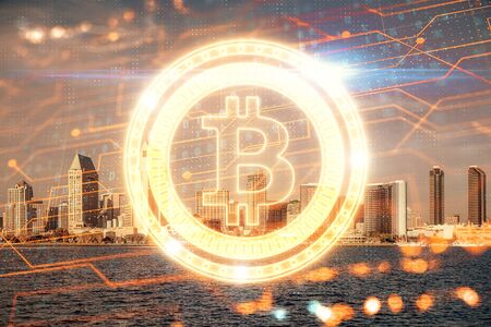 Double exposure of crypto currency theme hologram drawing and city veiw background. Concept of blockchain and bitcoin.の写真素材