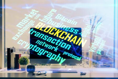 Double exposure of blockchain and crypto economy theme hologram and table with computer background. Concept of bitcoin cryptocurrency.の写真素材