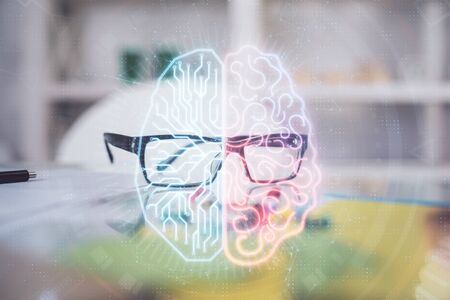 Brain drawings with glasses on the table background. Double exposure.の写真素材