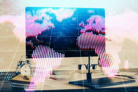 Double exposure of business theme icons and work space with computer background. Concept of success.の写真素材