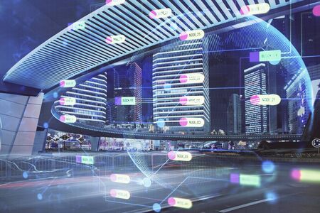 Data theme hologram drawing on city view with skyscrapers background multi exposure. Bigdata...