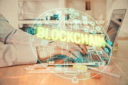 Blockchain theme hud with businessman working on computer on background. Concept of crypto chain....