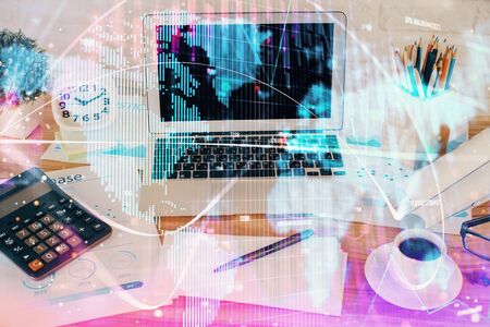 Double exposure of business theme icons and work space with computer background. Concept of success.の写真素材