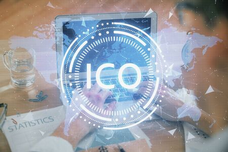 Blockchain theme hologram with man working on computer on background. Concept of crypto chain. Double exposure.の写真素材