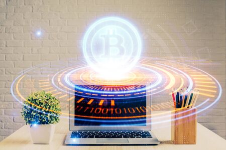 Double exposure of blockchain and crypto economy theme hologram and table with computer background. Concept of bitcoin cryptocurrency.の写真素材