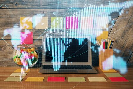Double exposure of business theme icons and work space with computer background. Concept of success.の写真素材