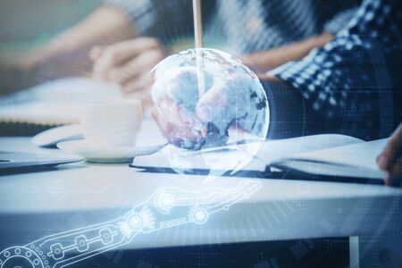 Man's hands with international data network theme double exposure icon. Concept of globalization.の写真素材