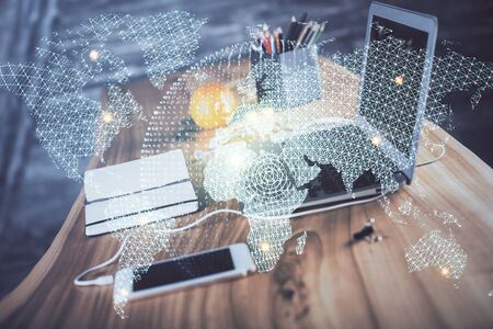 Multi exposure of business theme icons and table with computer background. Concept of success.の写真素材