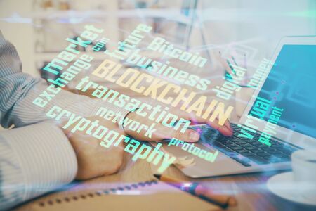 Blockchain theme hud with man working on computer on background. Concept of crypto chain. Double...