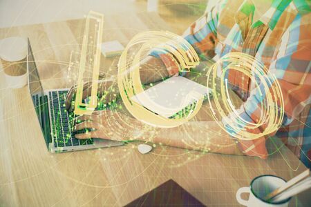 Blockchain theme hologram with man working on computer on background. Concept of crypto chain. Double exposure.の写真素材