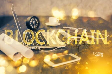 Double exposure of blockchain and crypto economy theme hologram and table with computer background. Concept of bitcoin cryptocurrency.の写真素材