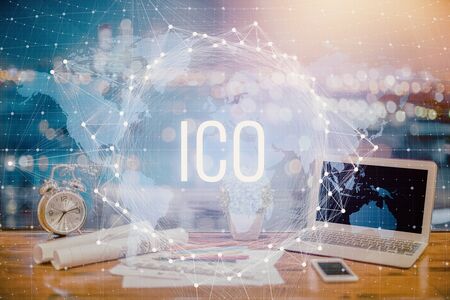 Double exposure of blockchain and crypto economy theme hologram and table with computer background. Concept of bitcoin cryptocurrency.の写真素材