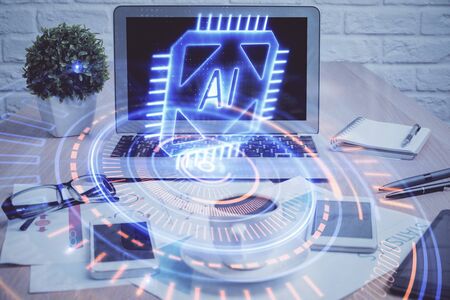 Double exposure of table with computer on background and data theme hologram. Data technology concept.の写真素材